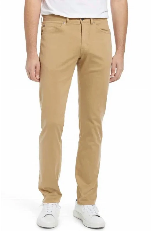 Shop now and save up to 40% on men’s wardrobe essentials.  Performance 5-Pocket Seasonal Pant In Warm Beige