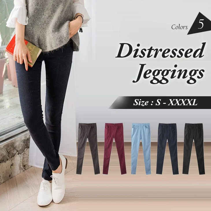 Limited-time promo – up to 70% off on men's essentials.  DISTRESSED STRETCH-FITTED JEGGINGS