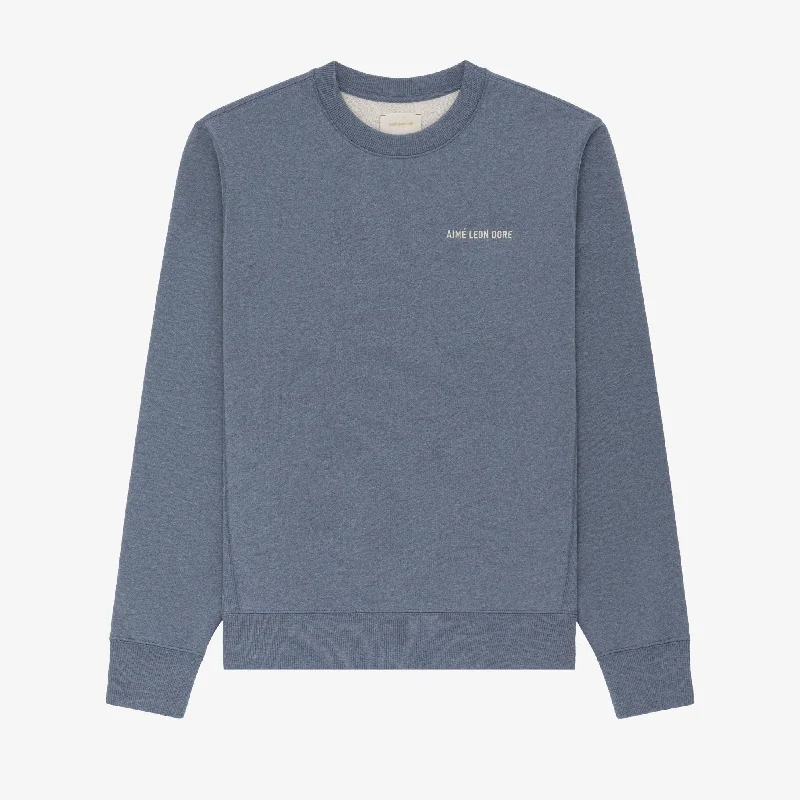 Shop new arrivals in clothing and save up to 60% off select items.  Melange Uniform Crewneck Sweatshirt