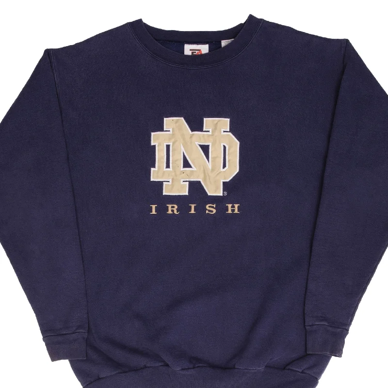 Exclusive online offer: Save 30% on all men's clothing.  VINTAGE NCAA NOTRE DAME UNIVERSITY IRISH SWEATSHIRT 1990S SIZE XL