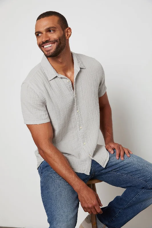 Men’s wardrobe essentials now at unbeatable prices.  CHRISTIAN BUTTON-UP SHIRT