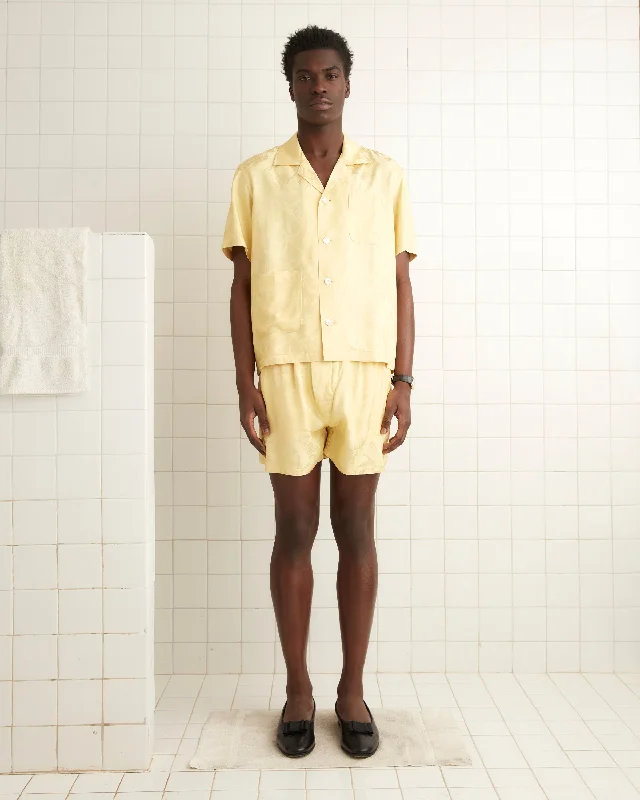 Don’t wait – Shop now for limited-time discounts on trendy clothing.  Football Jacquard Short Sleeve Louie Shirt - Yellow