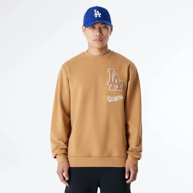 Shop now and save up to 40% on men’s wardrobe essentials.  LA Dodgers MLB Logo Select Beige Crew Neck Sweater