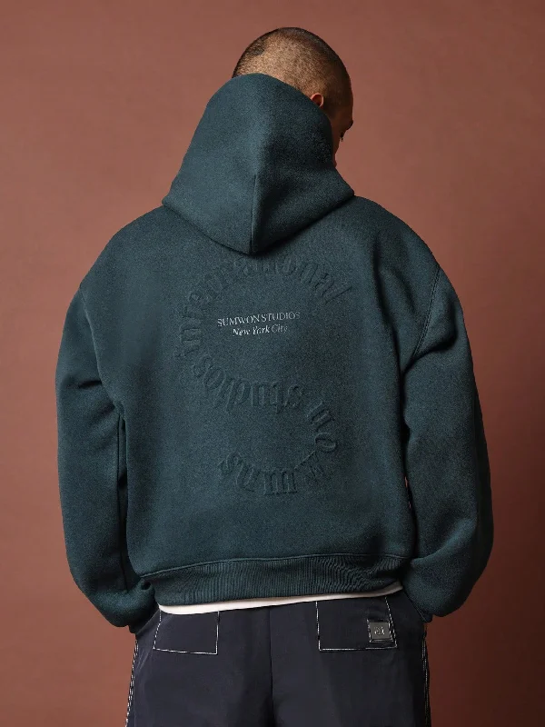 End-of-season sale – men’s clothing essentials up to 60% off!  Regular Fit Overhead Hoodie With Embossed Back Graphic Print