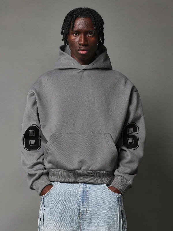 New season, new deals – shop men's clothing now!  Regular Fit Overhead Hoodie With Number Graphic Print